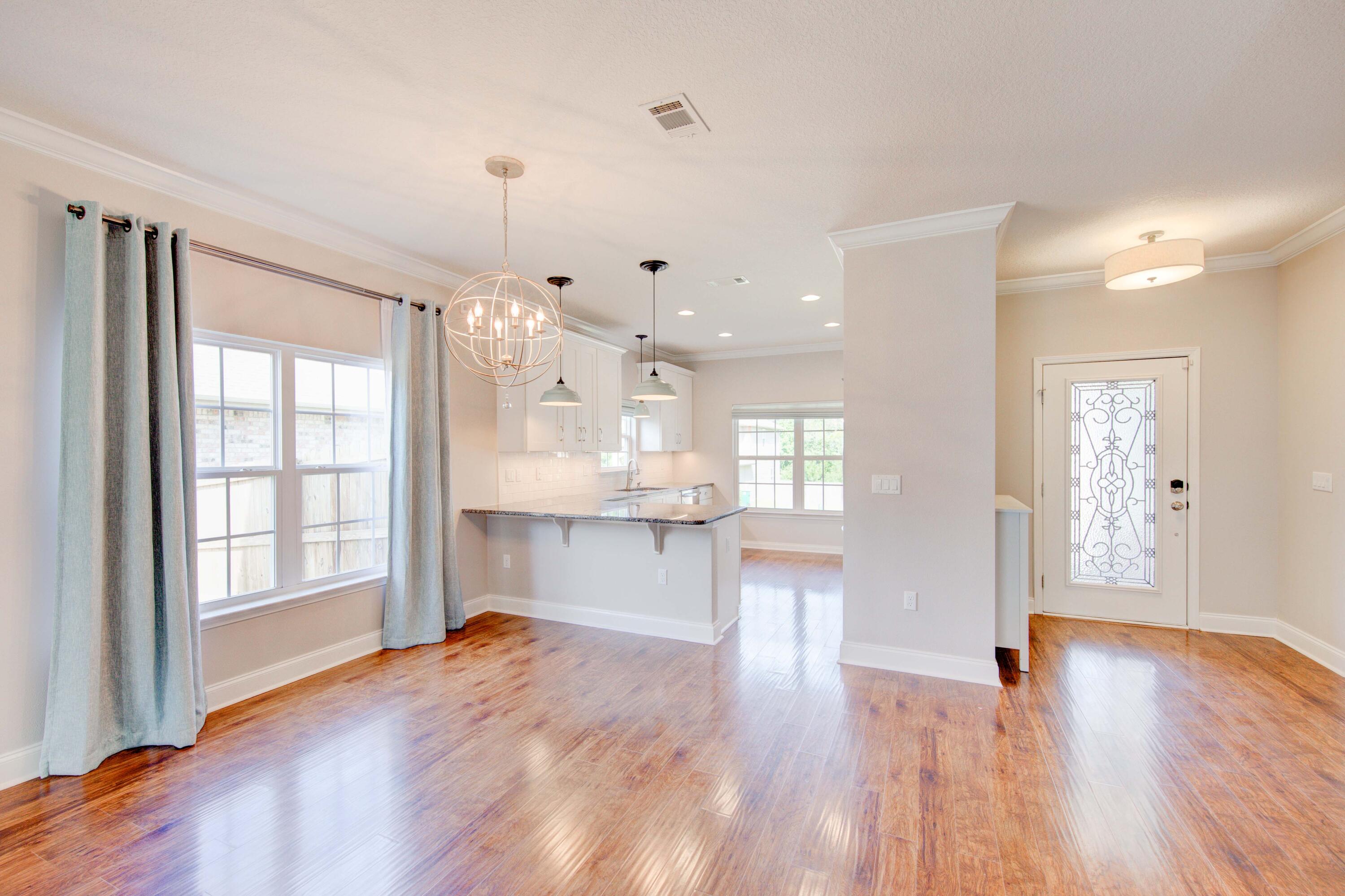 4557 Hermosa Road Crestview, FL 32539 - Photo 9 of 29 a view of an empty room and window