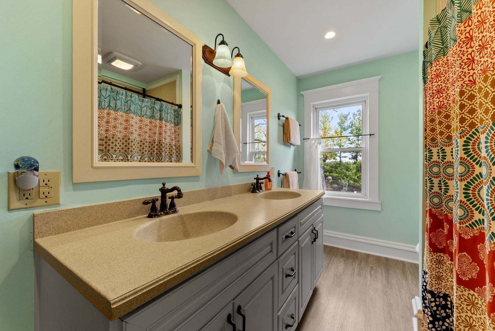 1009 Northwest 3rd Street Aledo, IL 61231 - Photo 21 of 27 a bathroom with a sink and a mirror