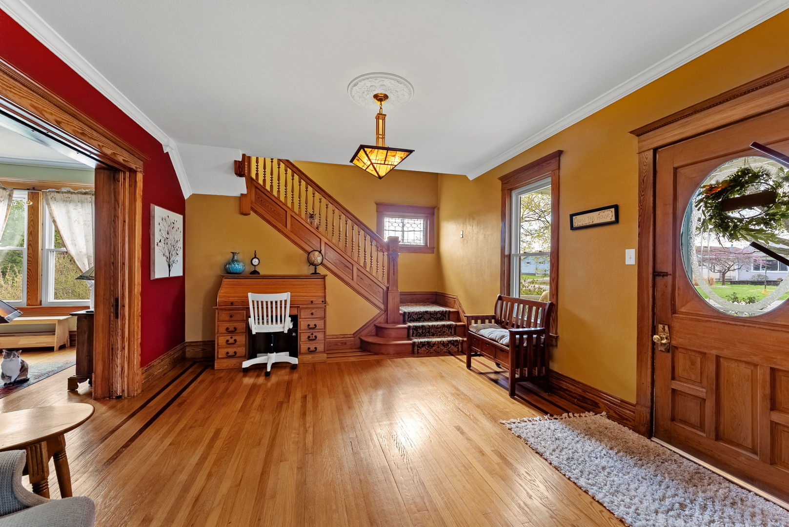 1009 Northwest 3rd Street Aledo, IL 61231 - Photo 5 of 27 a living room with furniture and a wooden floor