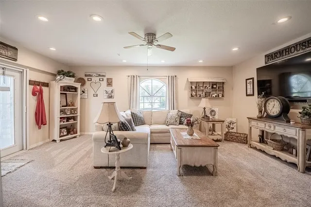 a view of a swimming pool with a patio