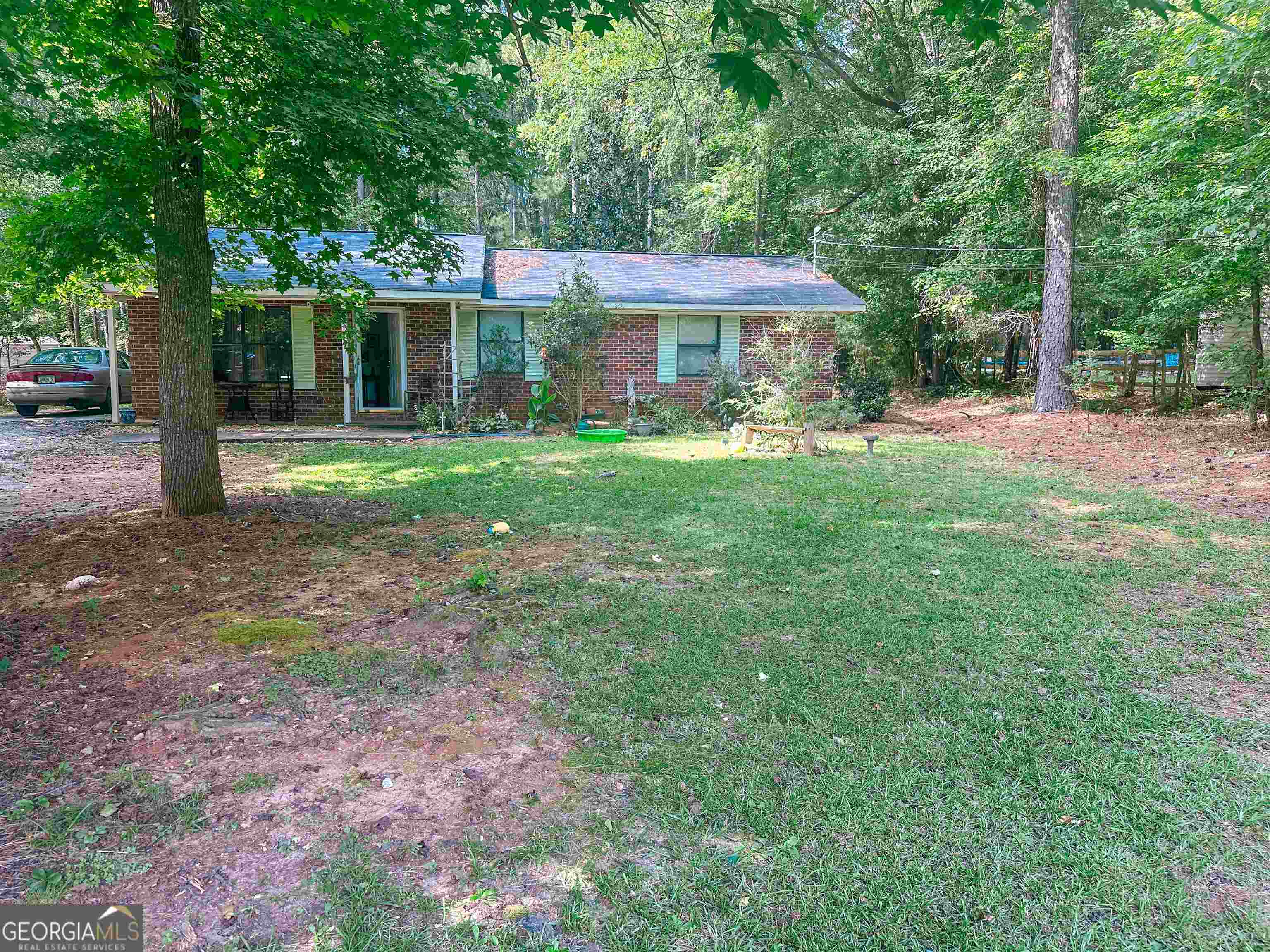 431 Sandtown Road LaGrange, GA 30240 - Photo 1 of 1 a front view of a house with yard patio and green space