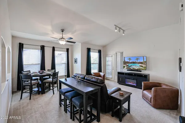 a view of a livingroom with furniture and window