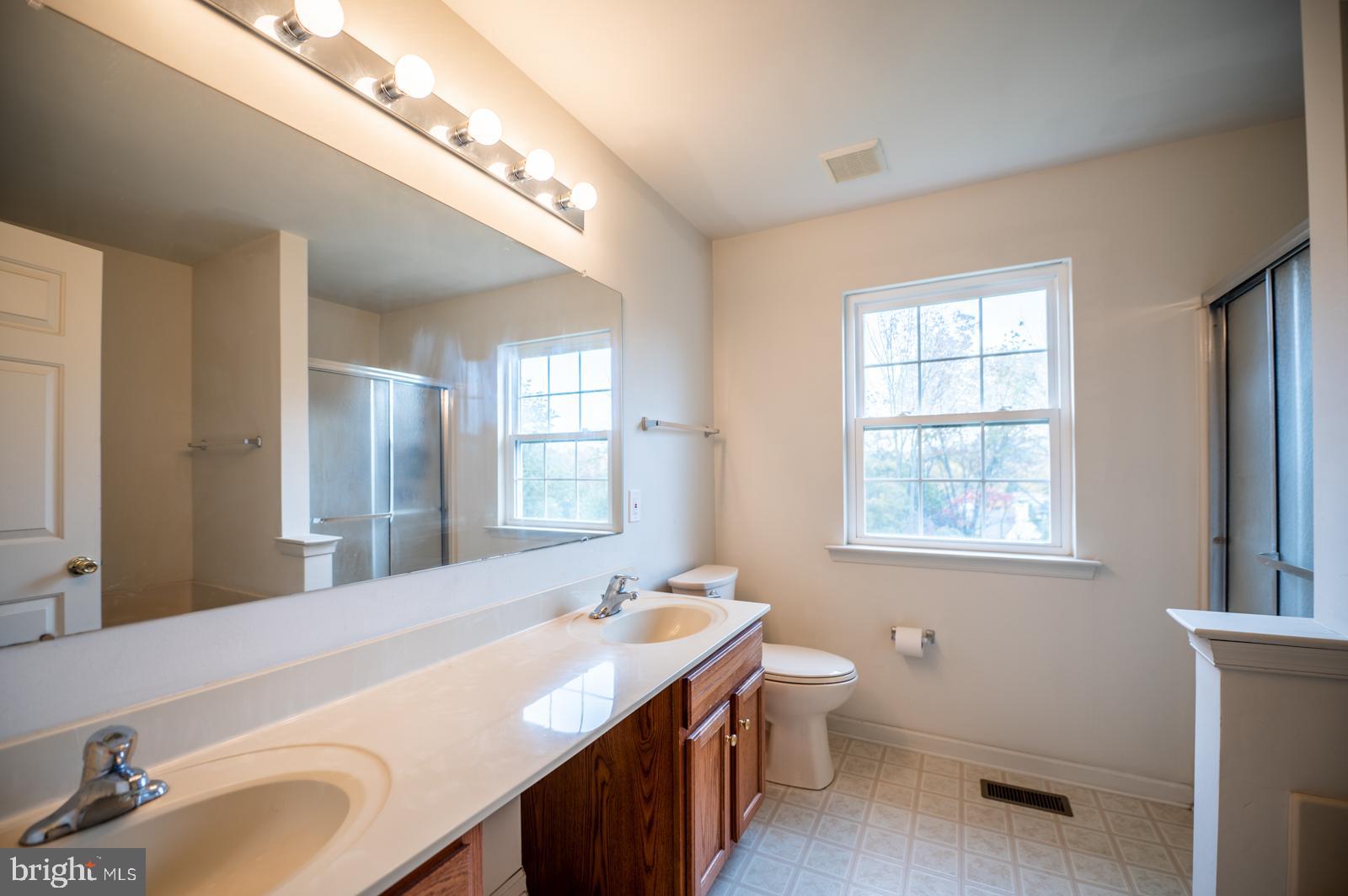 1514 Cloverhill Road Pottstown, PA 19464 - Photo 24 of 38 Primary bathroom w/ shower and soaking tub
