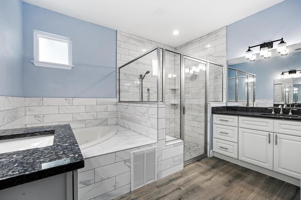 4 Uturn Court Palm Coast, FL 32164 - Photo 11 of 26 a bathroom with a granite countertop sink mirror and bathtub