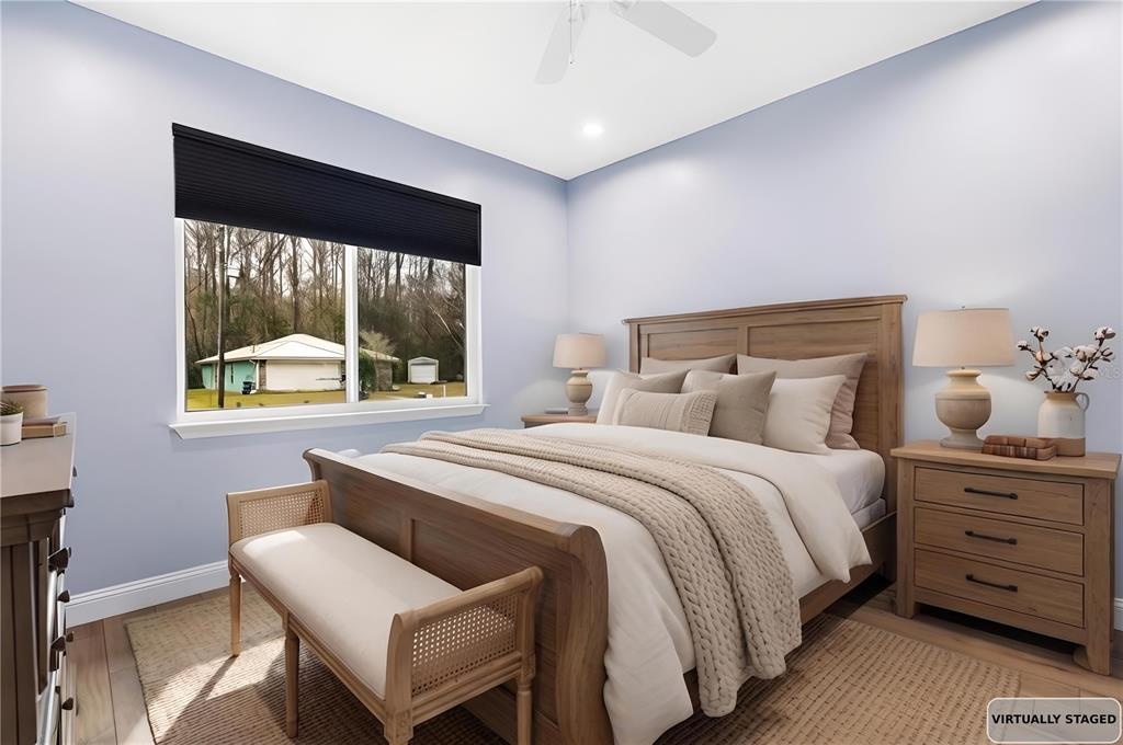 4 Uturn Court Palm Coast, FL 32164 - Photo 20 of 26 a bedroom with a bed and a window