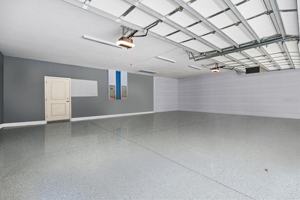 4 Uturn Court Palm Coast, FL 32164 - Photo 23 of 26 an empty room with windows