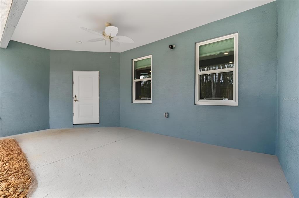 4 Uturn Court Palm Coast, FL 32164 - Photo 24 of 26 a view of an empty room with window and closet