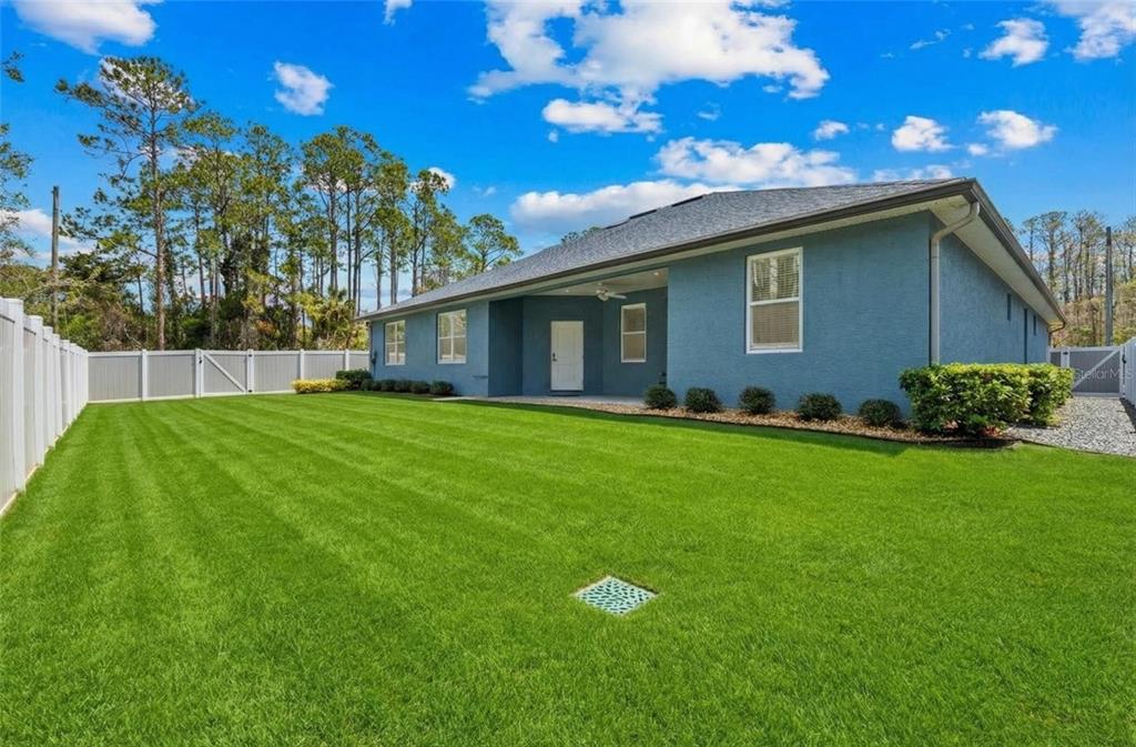 4 Uturn Court Palm Coast, FL 32164 - Photo 26 of 26 a house view with a garden space