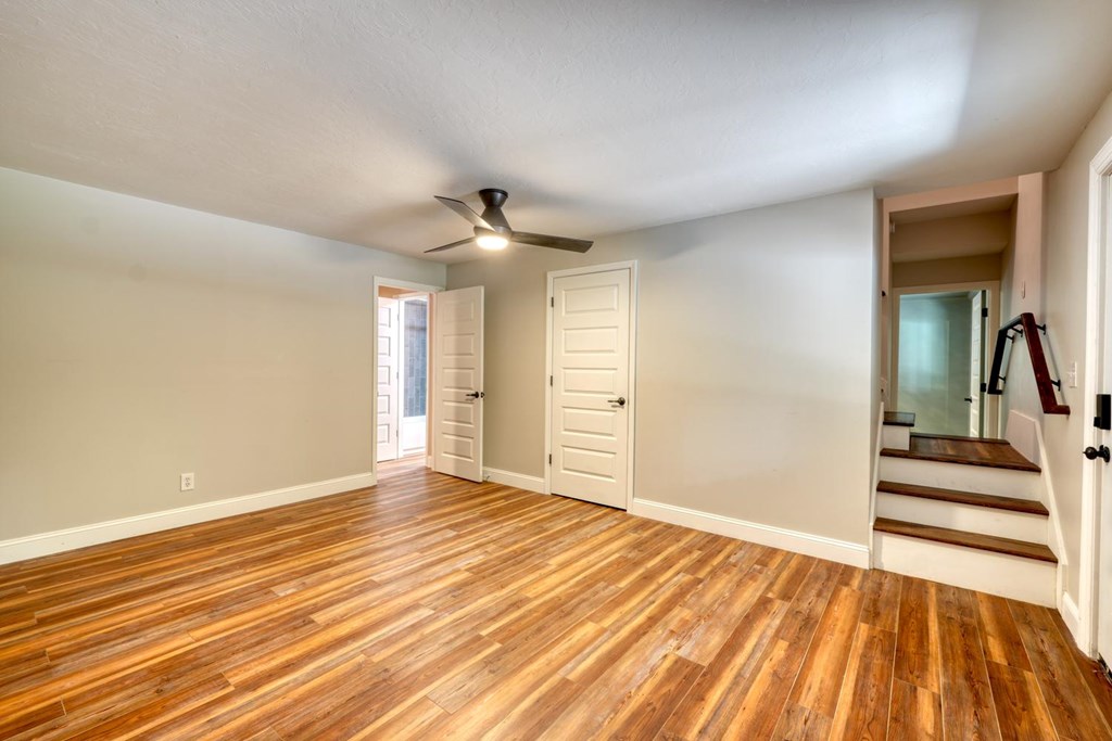 45 Mountain Stream Road Murphy, NC 28906 - Photo 8 of 33 a view of a room with wooden floor and ceiling fan