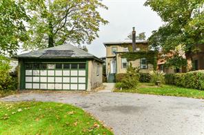 25 Tier Street Bronx, NY 10464 - Photo 1 of 1 a front view of a house with a garden