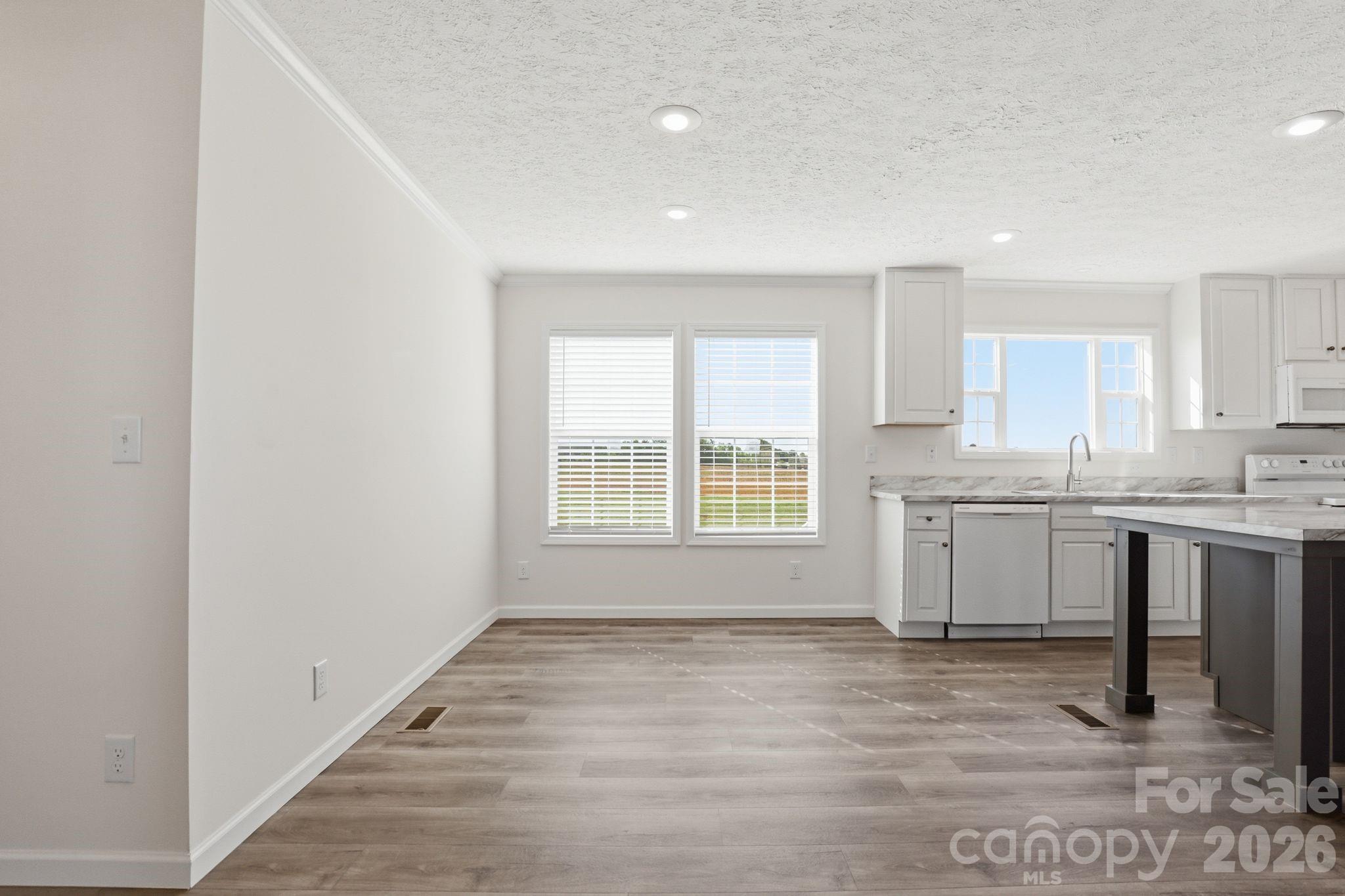197 Burleson Point Woodleaf, NC 27054 - Photo 11 of 30 a view of a kitchen with window