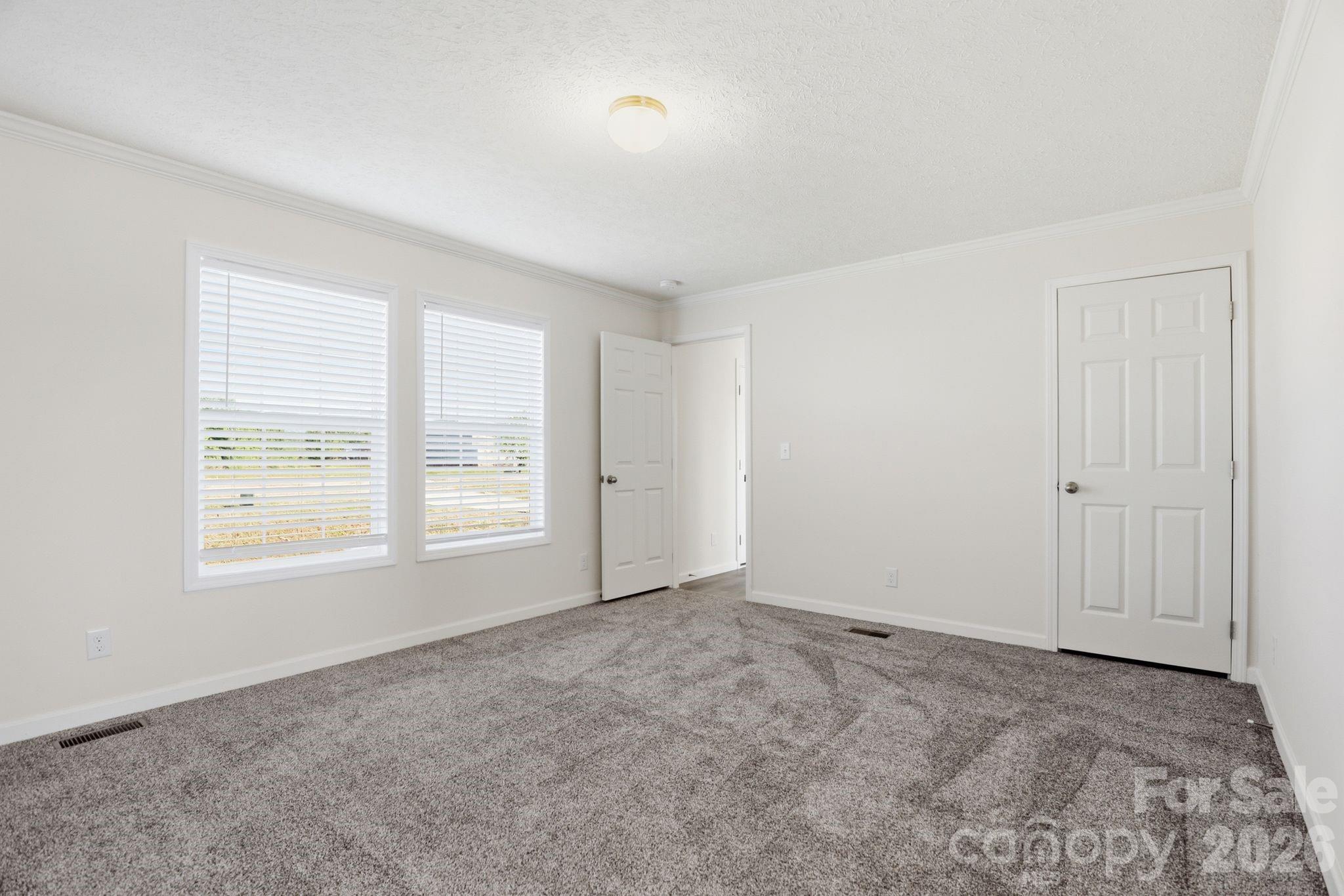 197 Burleson Point Woodleaf, NC 27054 - Photo 12 of 30 a view of an empty room with a window