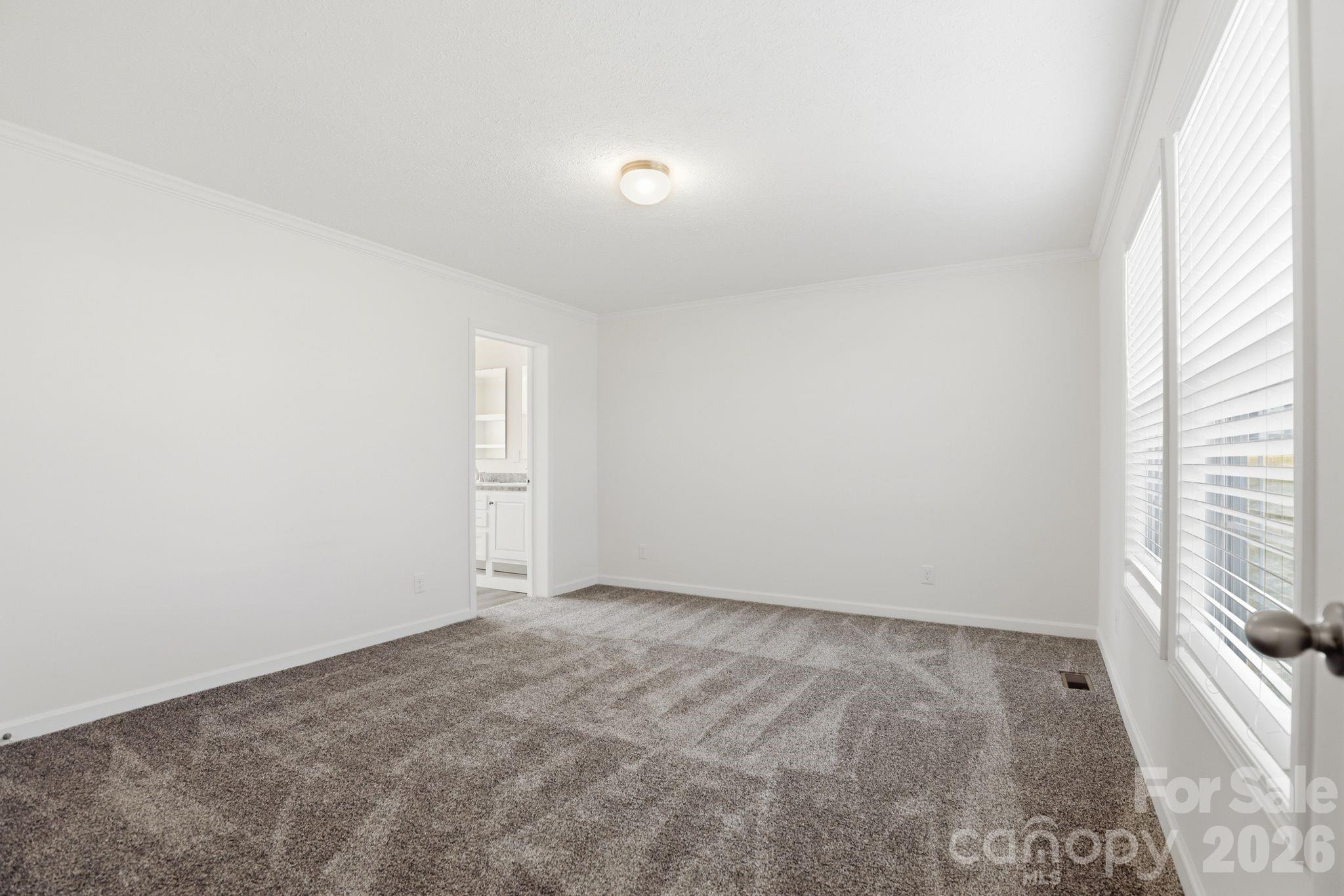 197 Burleson Point Woodleaf, NC 27054 - Photo 13 of 30 a view of an empty room and a window