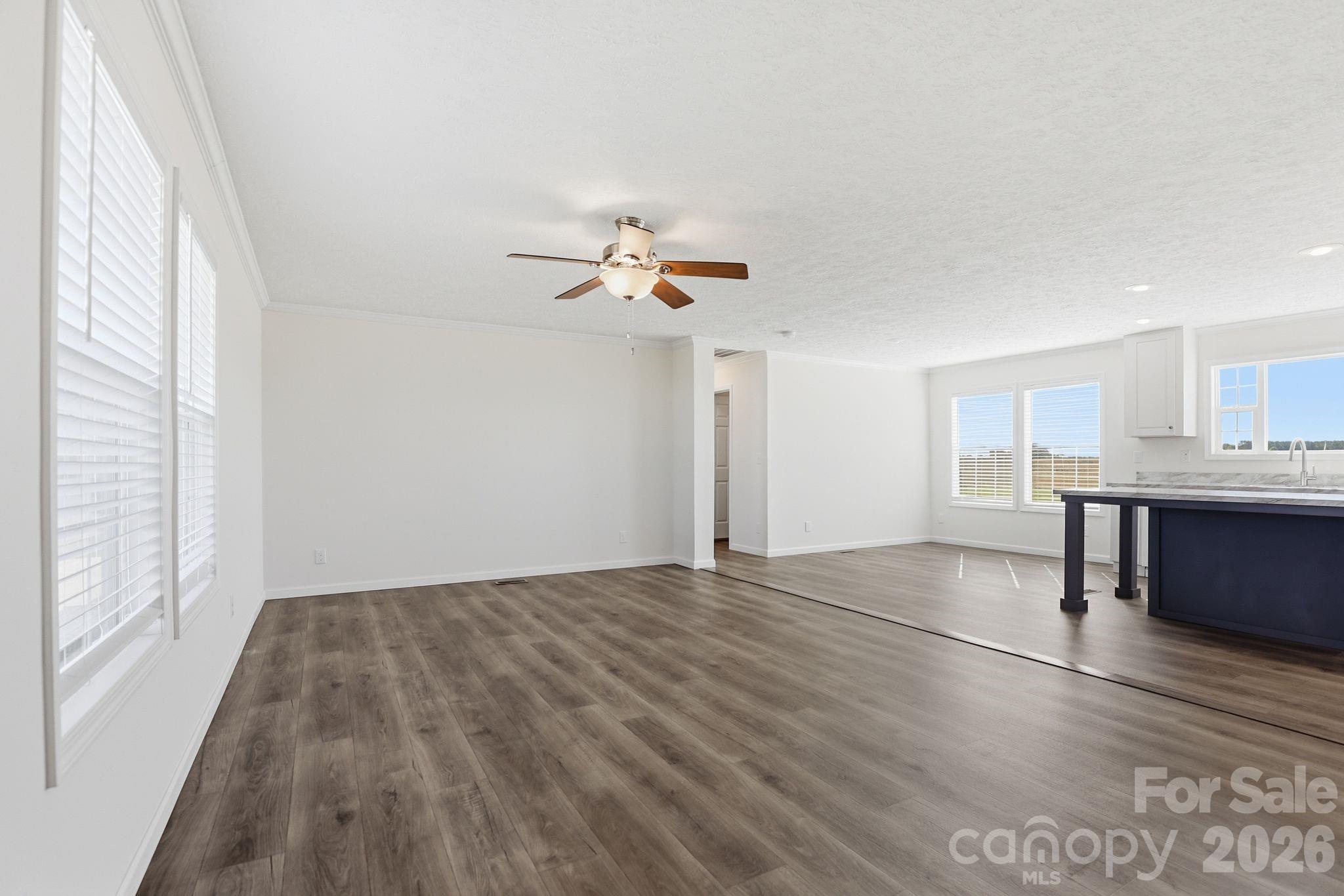 197 Burleson Point Woodleaf, NC 27054 - Photo 5 of 30 a view of workspace with wooden floor and window