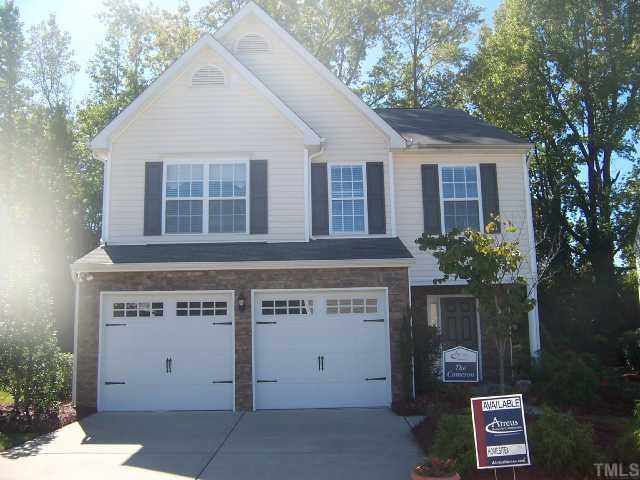 3718 Burtons Barn Street Raleigh, NC 27610 - Photo 1 of 9 a view of a house with a garage