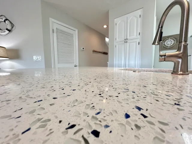a view of hallway with wooden floor