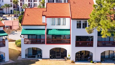 a view of a patio with swimming pool
