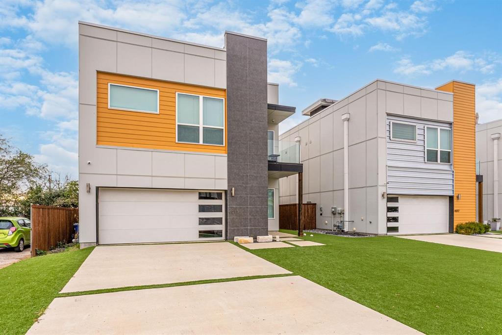 4013 Ivanhoe Lane Dallas, TX 75212 - Photo 2 of 38 Contemporary house with a garage and a front lawn