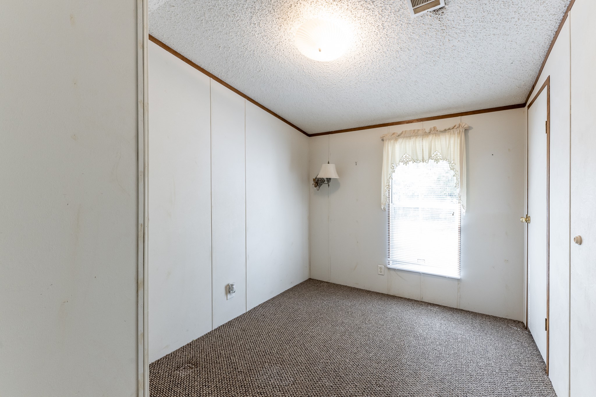 400 Marina Drive Trinity, TX 75862 - Photo 14 of 25 an empty room with windows