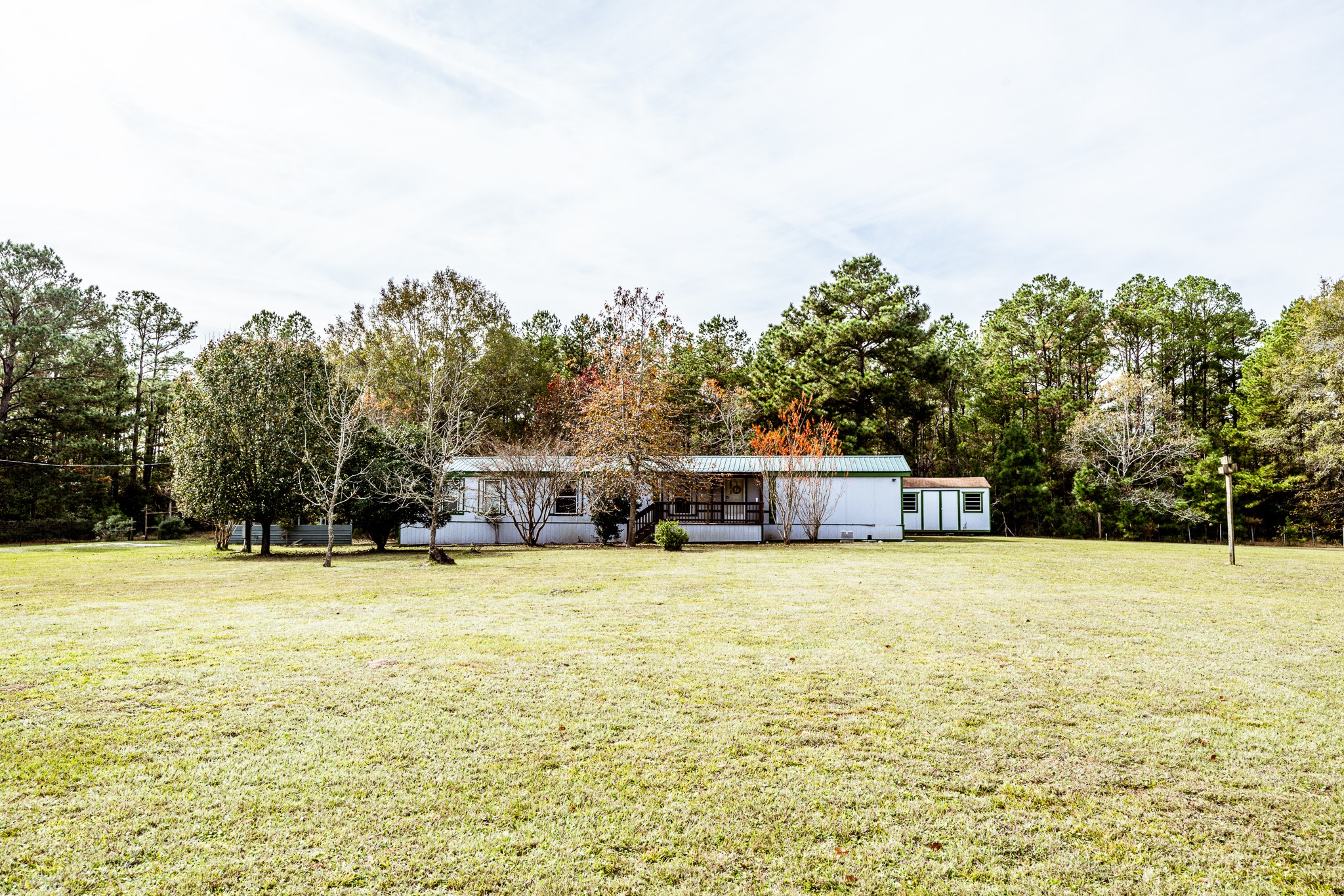400 Marina Drive Trinity, TX 75862 - Photo 19 of 25 a house with yard in front of it