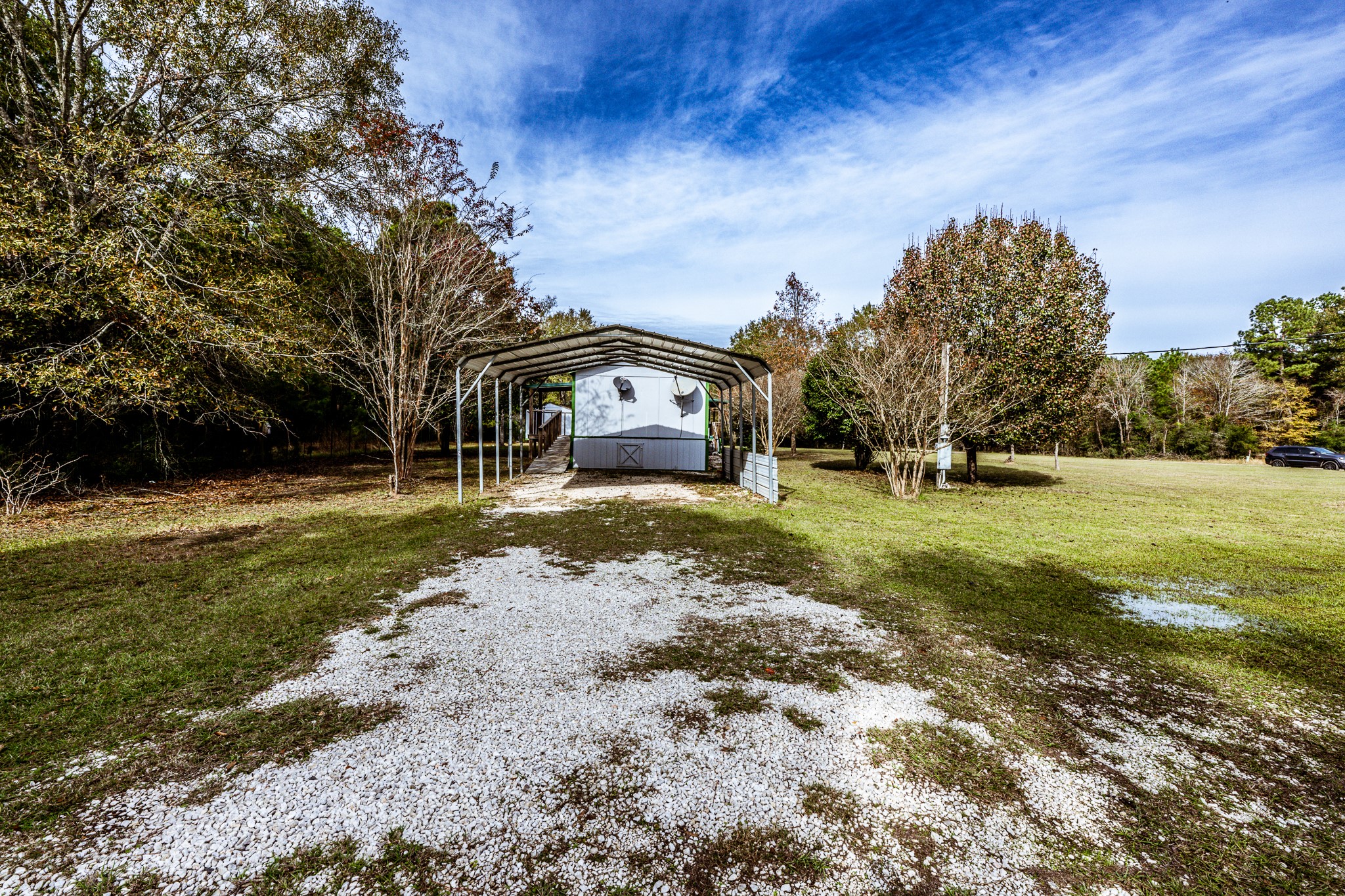 400 Marina Drive Trinity, TX 75862 - Photo 21 of 25 a view of a house with a yard