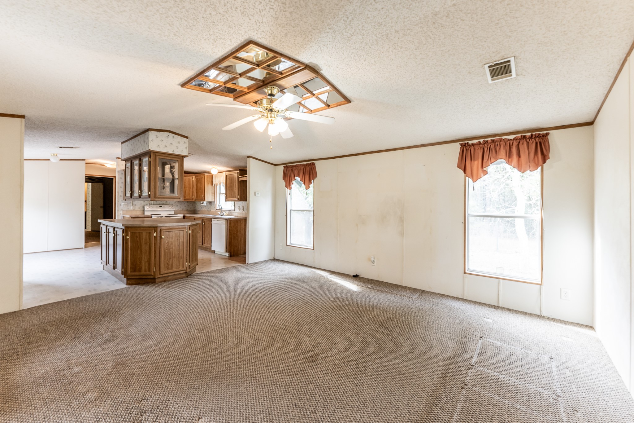 400 Marina Drive Trinity, TX 75862 - Photo 3 of 25 a big room with chandelier and windows