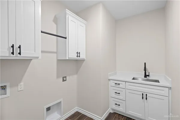 a view of cabinets with wooden floor