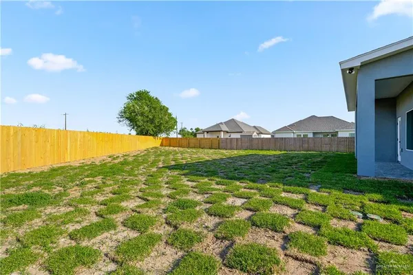a view of a field with an empty space