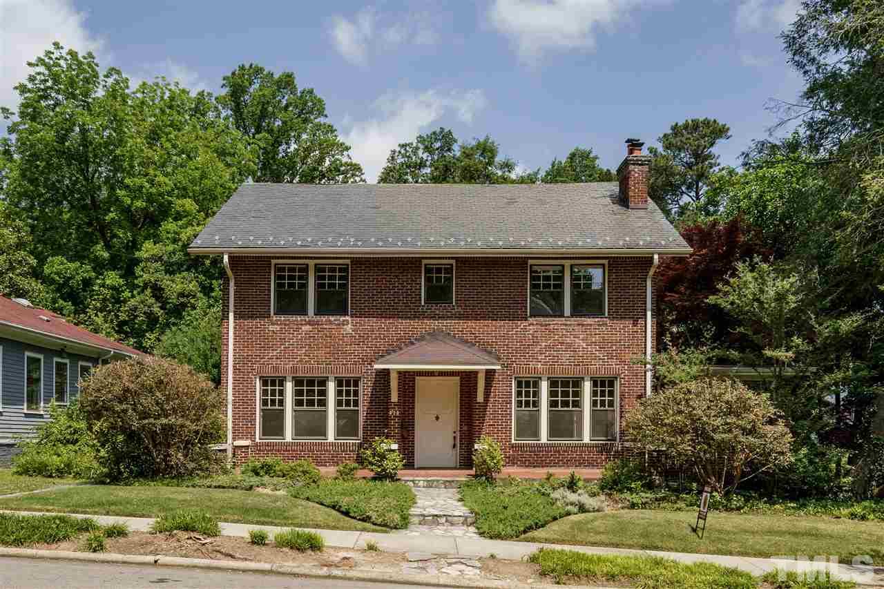 311 Hillcrest Road Raleigh, NC 27605 - Photo 1 of 30 front view of a house with a yard