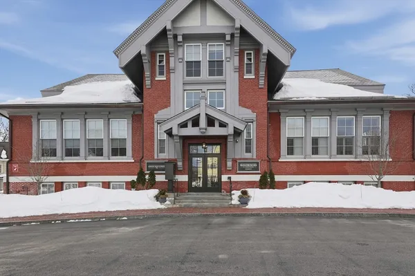 a front view of a house with a outdoor space