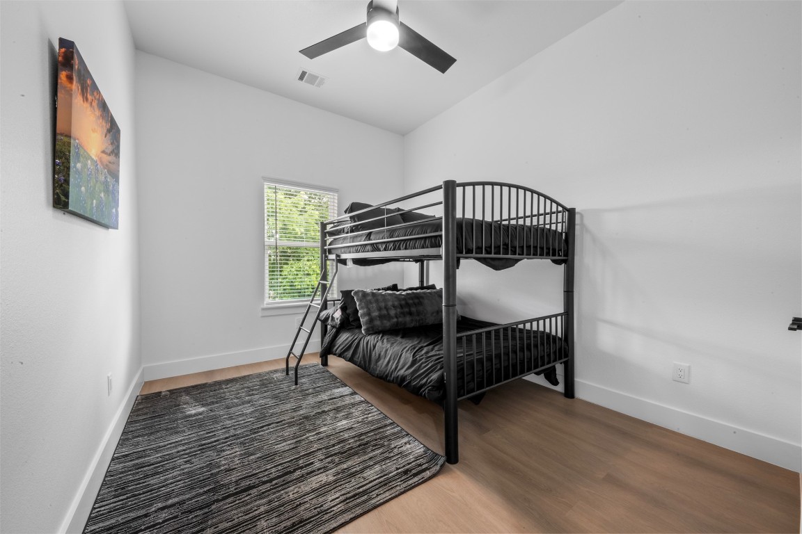 6815 Paris Street Houston, TX 77021 - Photo 18 of 30 a bedroom with furniture and a window