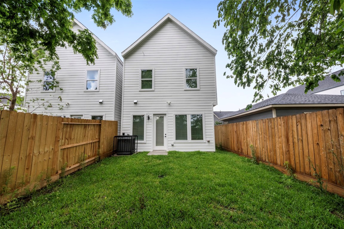 6815 Paris Street Houston, TX 77021 - Photo 6 of 30 a front view of a house with garden