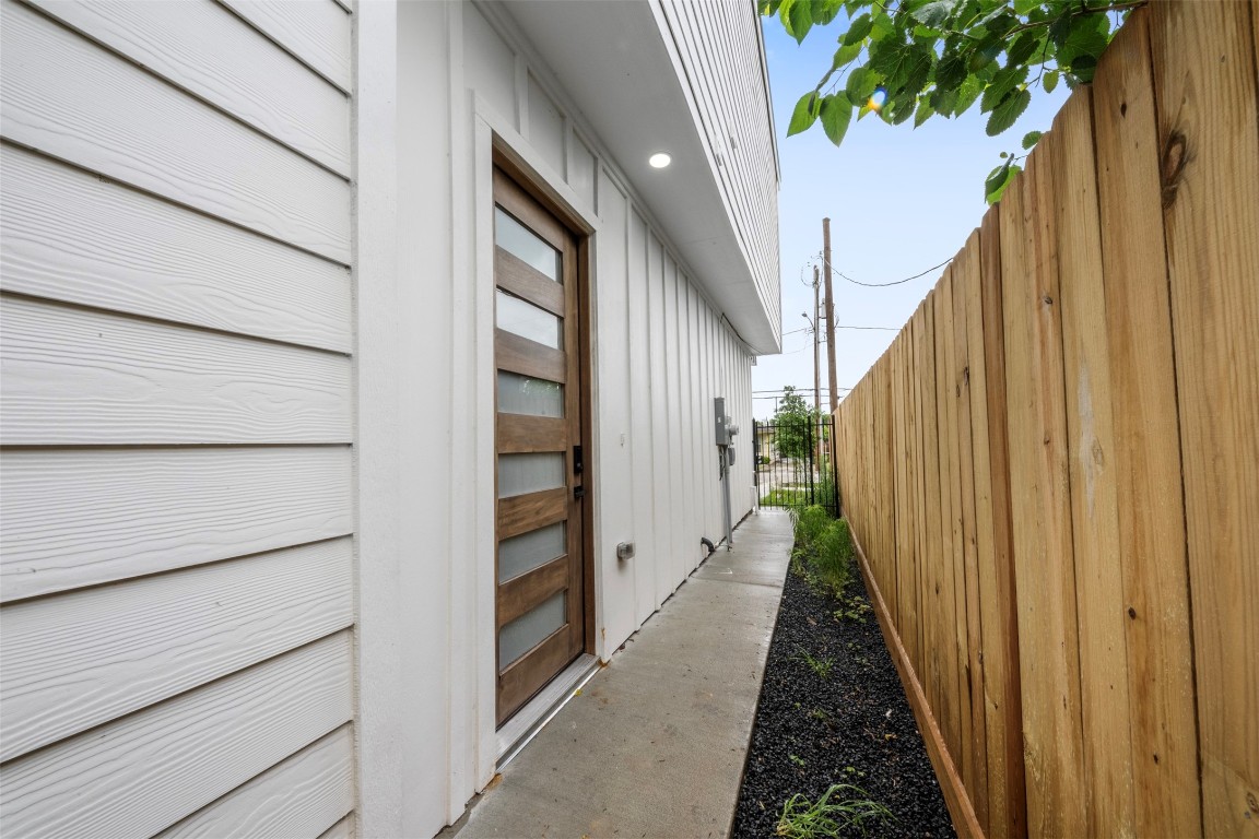 6815 Paris Street Houston, TX 77021 - Photo 9 of 30 a view of a balcony with wooden stairs