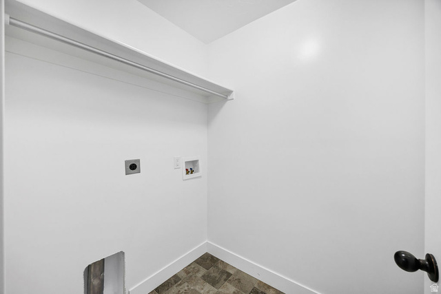 2483 South 1296th Street West Logan, UT 84321 - Photo 17 of 45 Dedicated laundry area featuring a white storage shelf and hanging rod