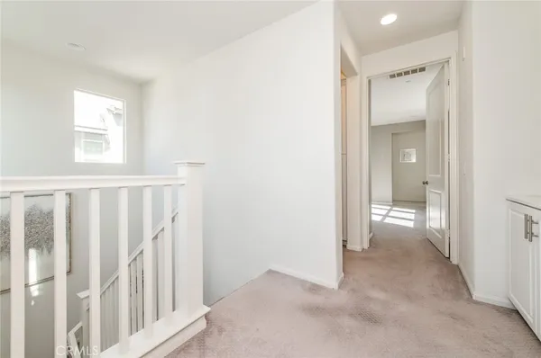 a view of an empty room and a gallery