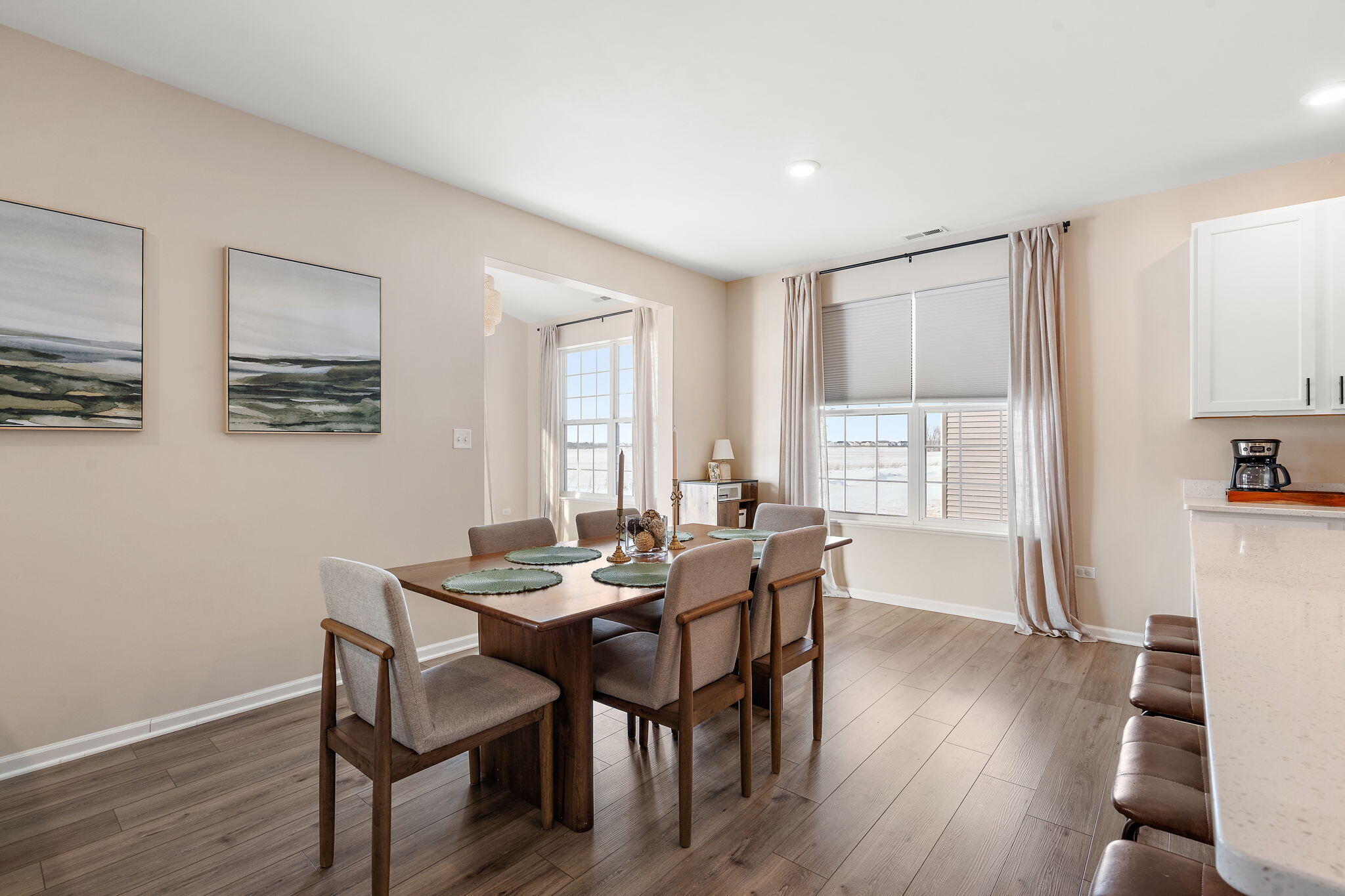 11664 Thomas Street Winfield, IN 46307 - Photo 14 of 30 a dining room with furniture and wooden floor