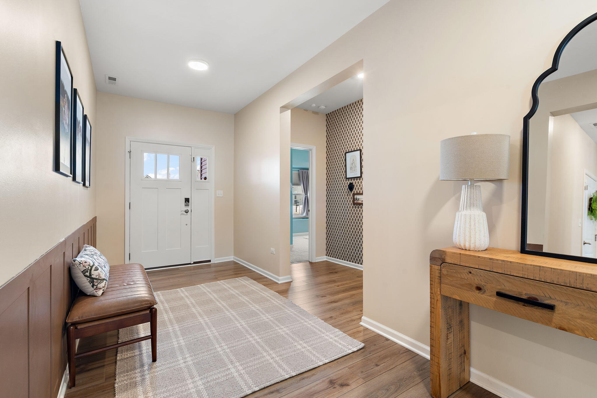 11664 Thomas Street Winfield, IN 46307 - Photo 4 of 30 a living room with furniture and a dresser
