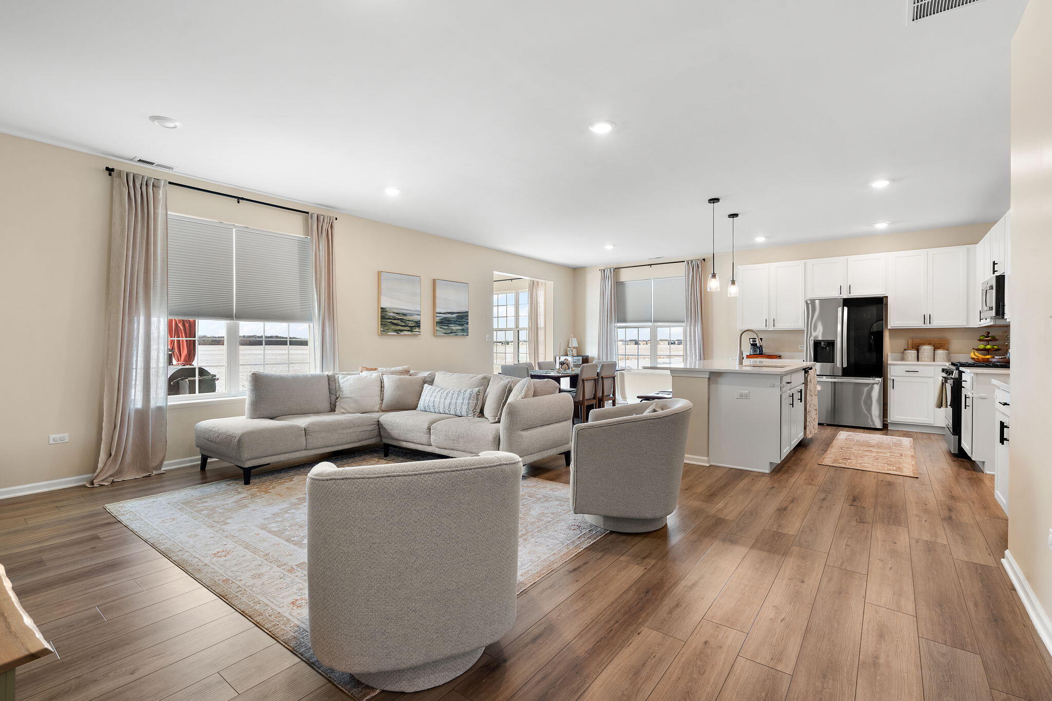 11664 Thomas Street Winfield, IN 46307 - Photo 7 of 30 a living room with furniture and kitchen view