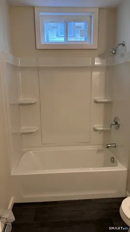 a bathroom with a bathtub