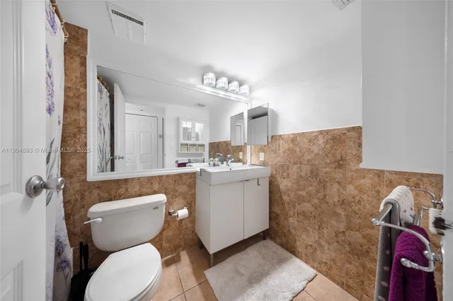 $375,000 | 7601 East Treasure Drive, Unit 1021, North Bay Village, FL 33141