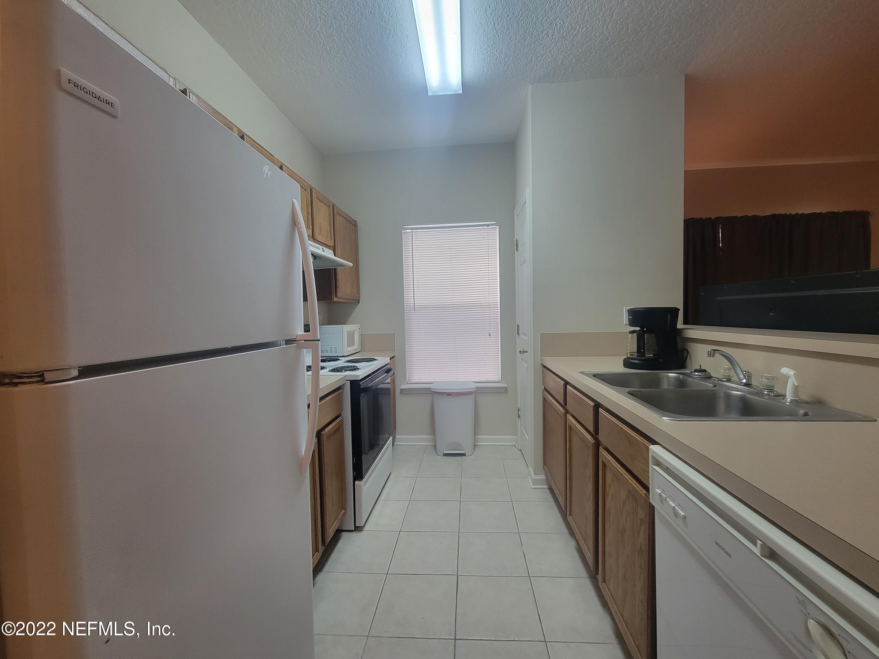 5260 Collins Road, Unit 605 Jacksonville, FL 32244 - Photo 5 of 13 20220720_144331