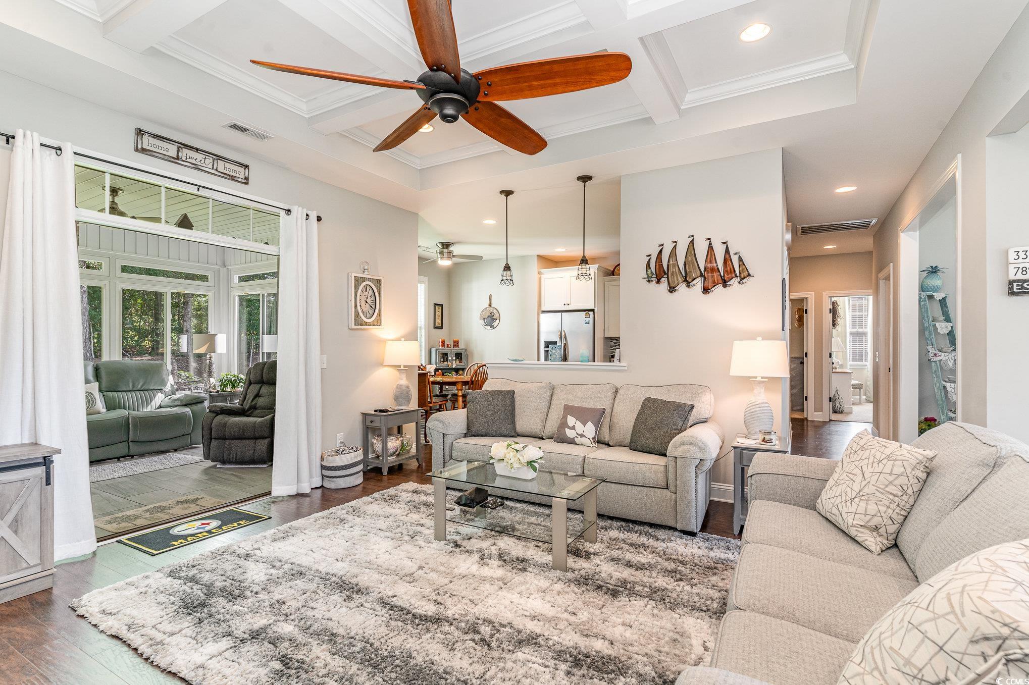 4204 Ridgewood Drive Conway, SC 29526 - Photo 11 of 38 Living room featuring beamed ceiling, ceiling fan,