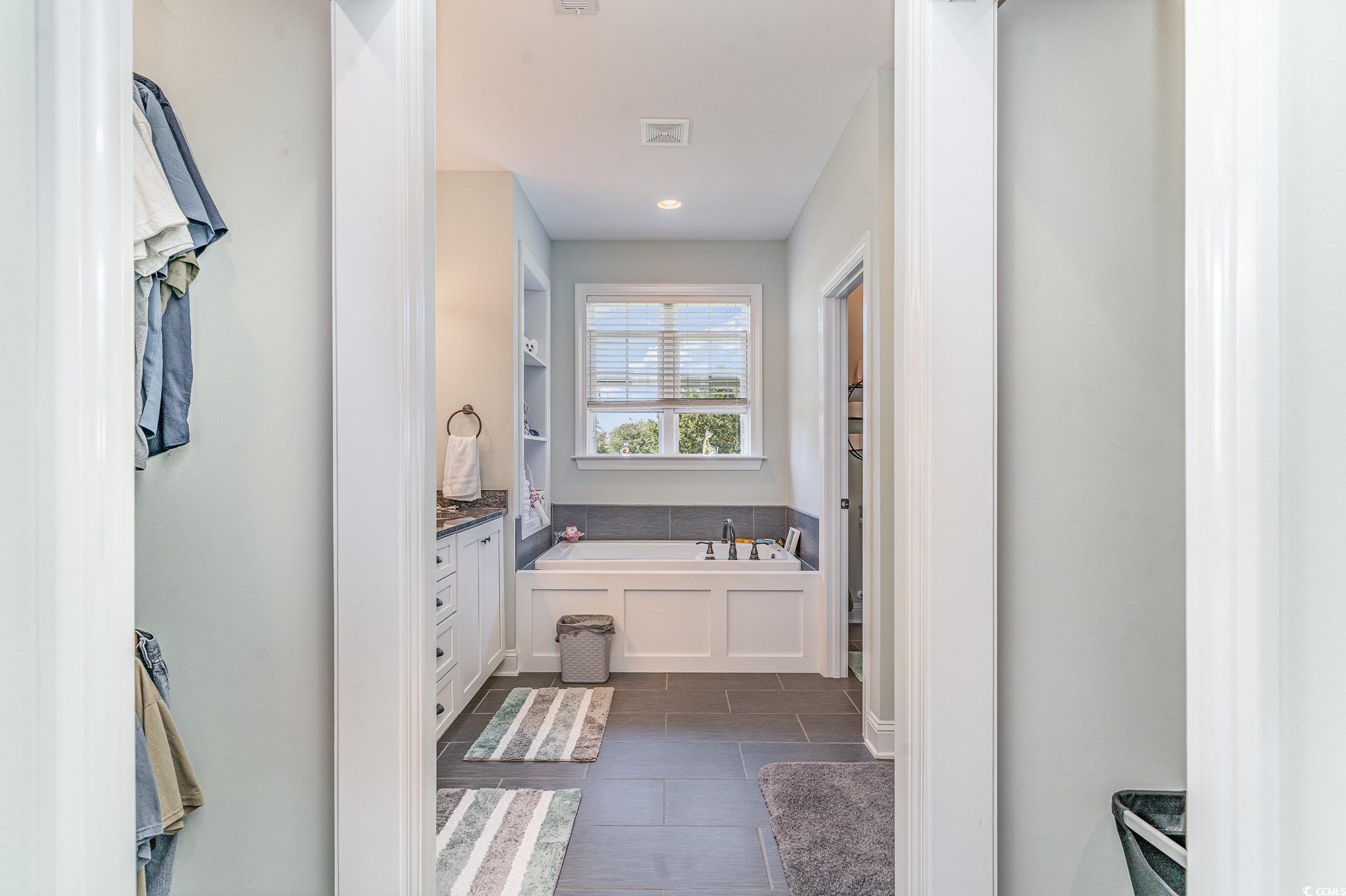 4204 Ridgewood Drive Conway, SC 29526 - Photo 18 of 38 Bathroom with vanity and a bath