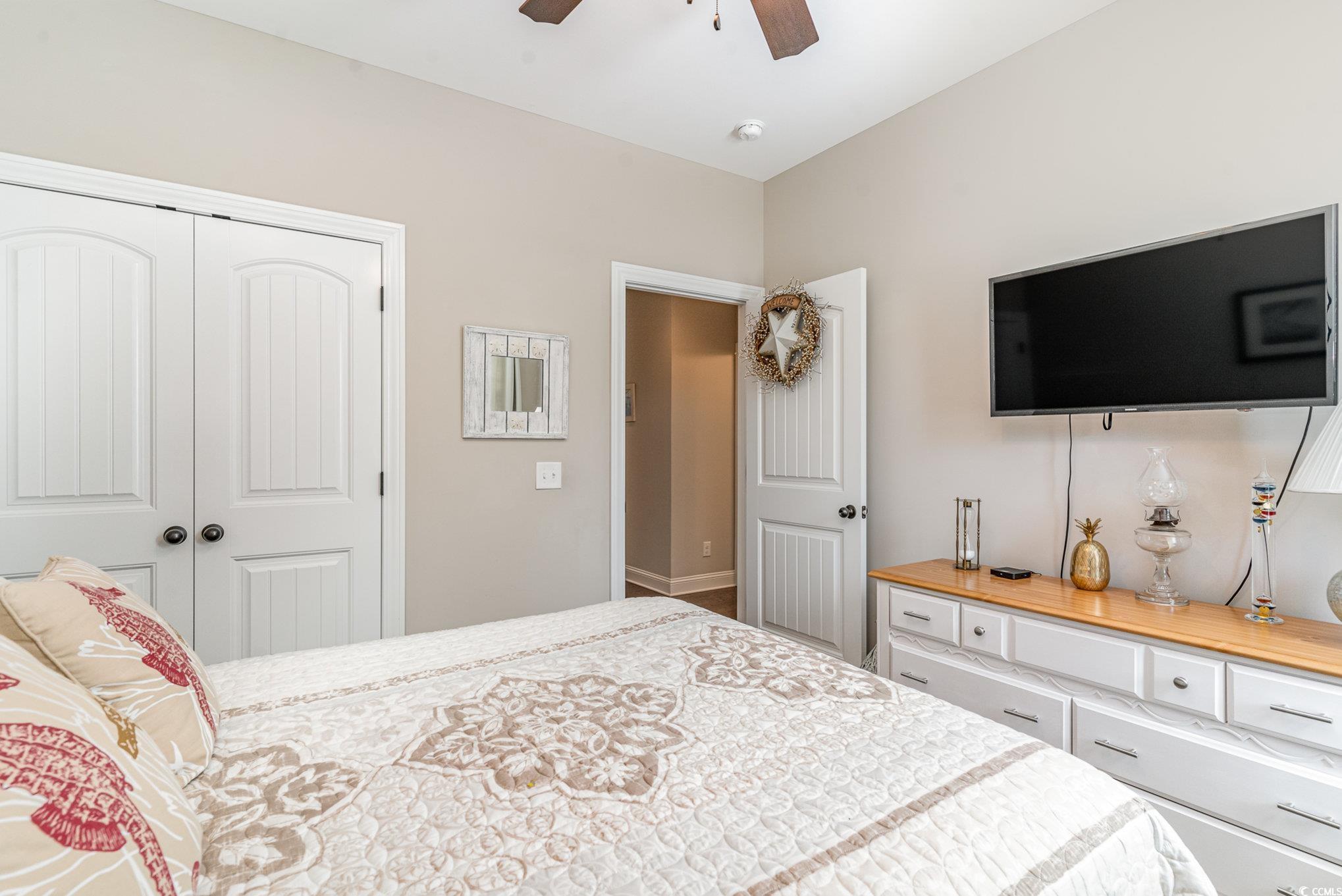 4204 Ridgewood Drive Conway, SC 29526 - Photo 22 of 38 Bedroom featuring ceiling fan and a closet