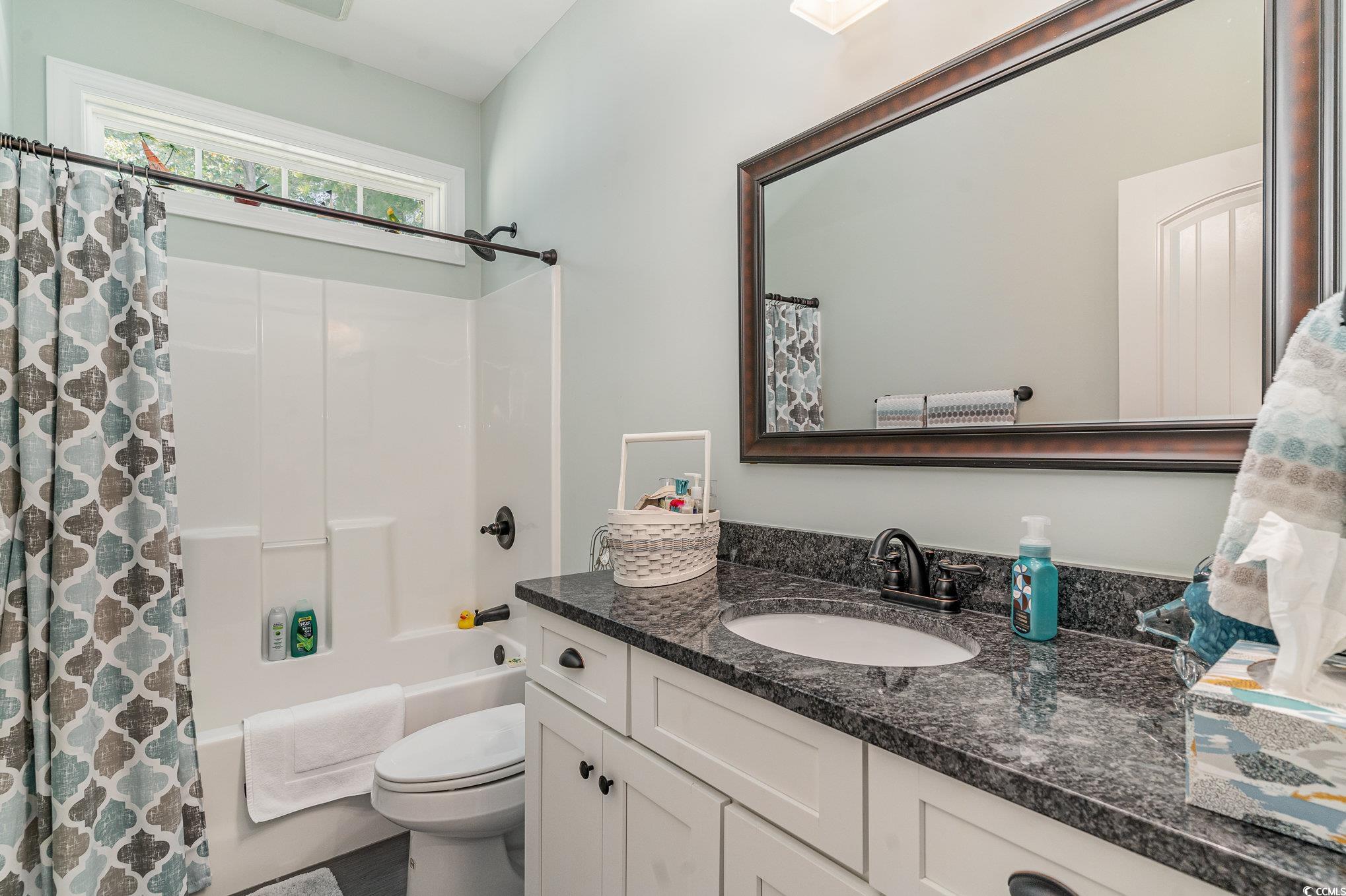 4204 Ridgewood Drive Conway, SC 29526 - Photo 23 of 38 Full bathroom featuring vanity, toilet, and shower