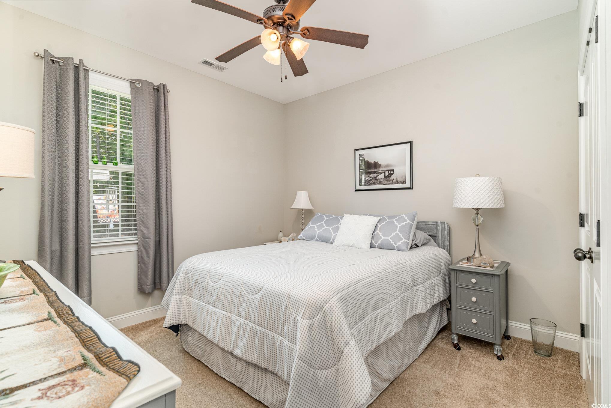 4204 Ridgewood Drive Conway, SC 29526 - Photo 24 of 38 Bedroom featuring light carpet and ceiling fan