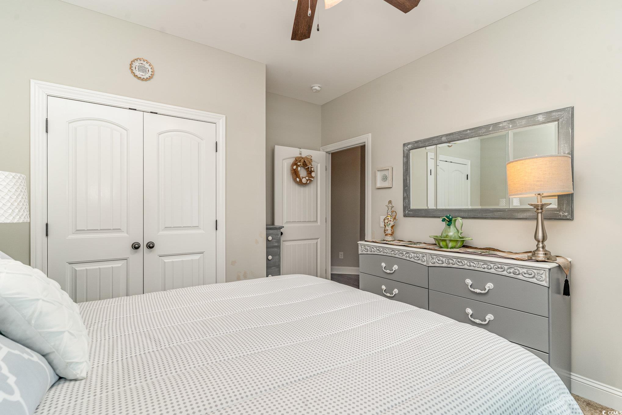 4204 Ridgewood Drive Conway, SC 29526 - Photo 25 of 38 Bedroom featuring ceiling fan and a closet