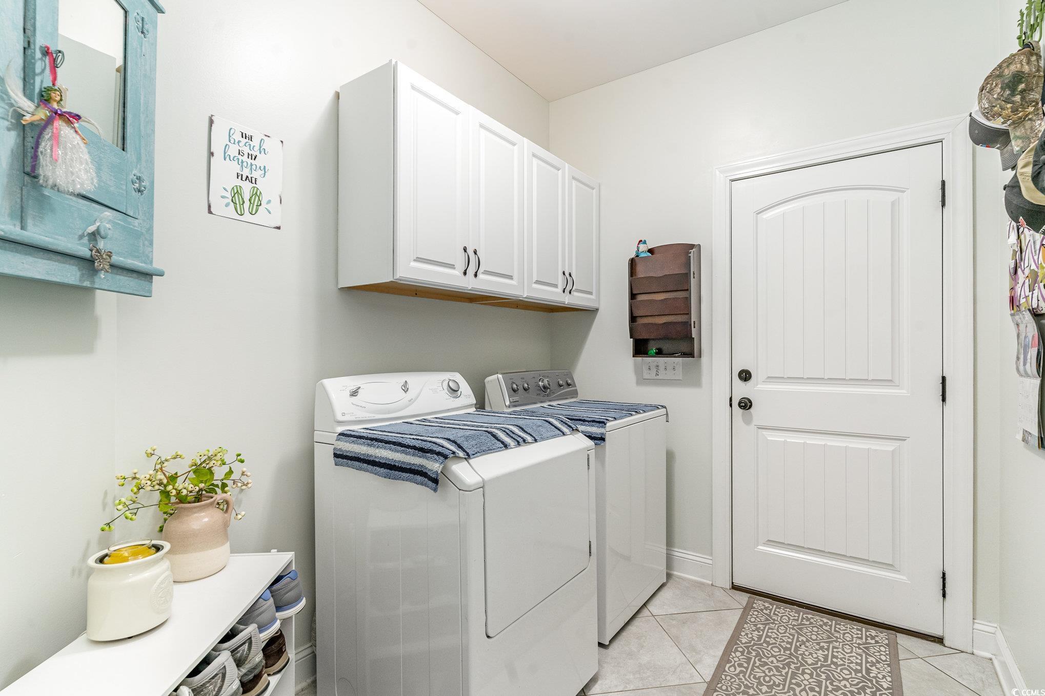 4204 Ridgewood Drive Conway, SC 29526 - Photo 27 of 38 Laundry room featuring light tile patterned floors