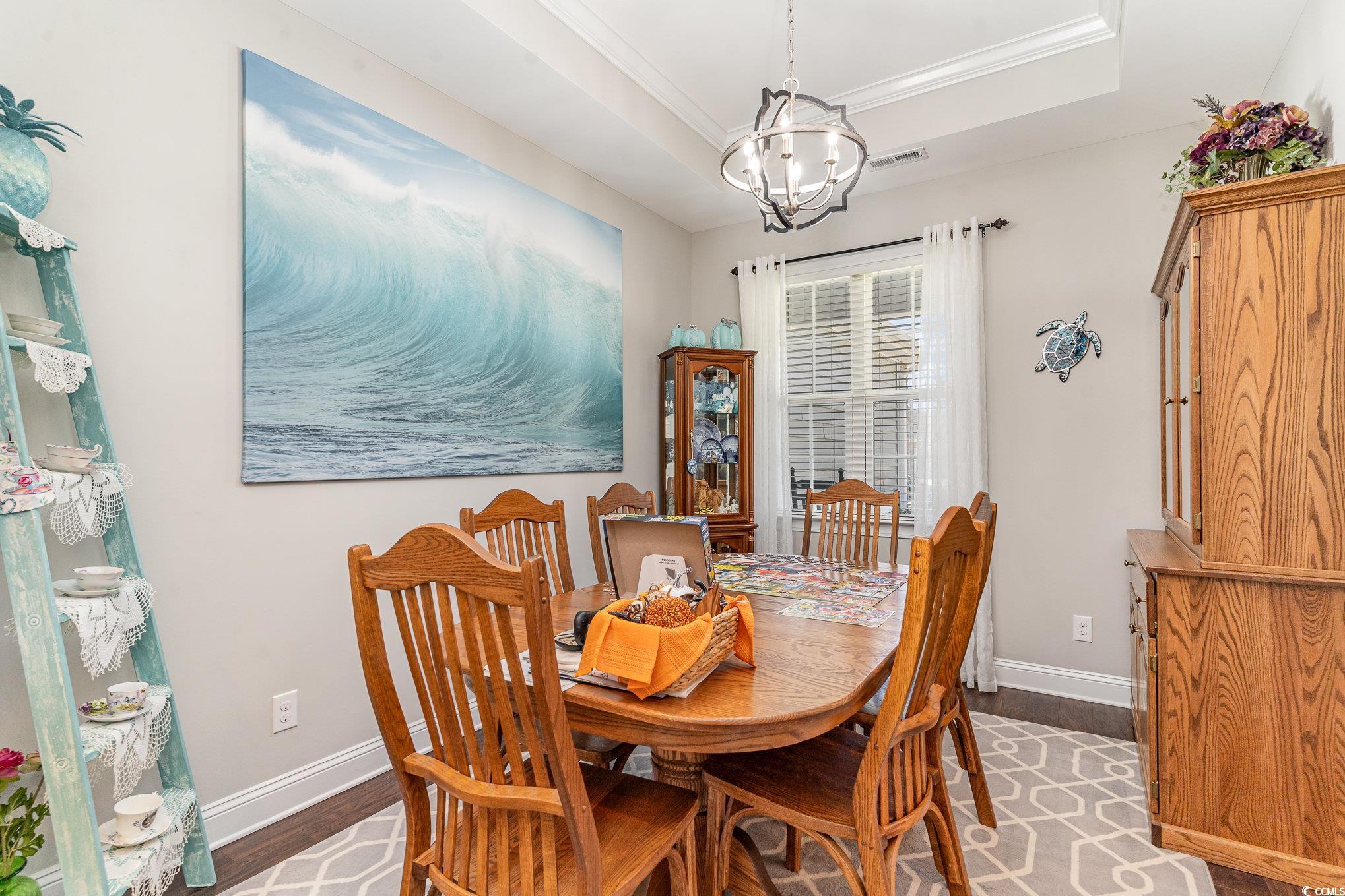 4204 Ridgewood Drive Conway, SC 29526 - Photo 8 of 38 Dining space featuring ornamental molding, a notab