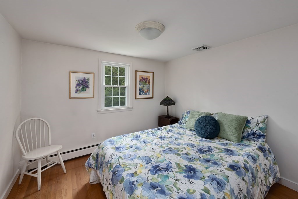 6 Trask Road Boxford, MA 01921 - Photo 16 of 36 a bedroom with a bed and a window